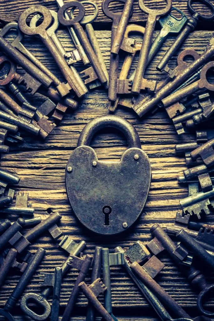 Old locks and keys pn an old wooden table